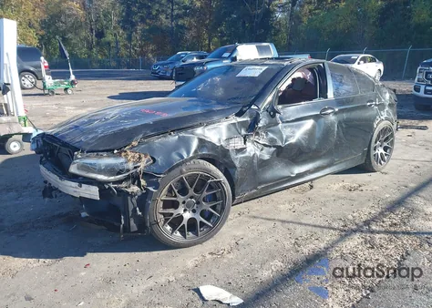 2014 BMW M5 из США, поврежденный, VIN WBSFV9C54ED097798